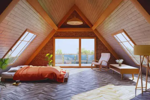 Acogedor dormitorio abuhardillado con cama naranja, mecedora y grandes ventanales. Ideal para **aprovechar buhardilla muy baja** con estilo y luz.