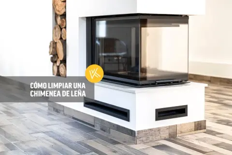 Chimenea moderna de leña con cristal. Aprende cómo limpiar chimenea desde abajo para mantenerla impecable.