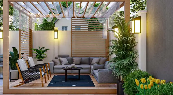 Un espacio acogedor con sofá, sillones y plantas, ideal para el diseño de jardines pequeños. Flores amarillas y luces cálidas crean un ambiente relajante.