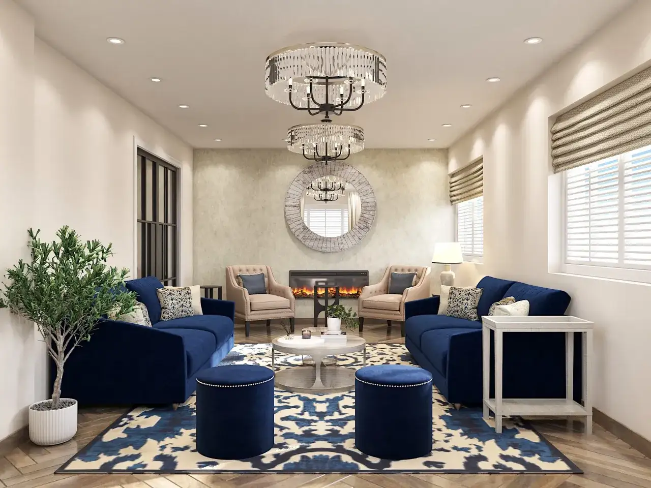 Elegante sal&oacute;n comedor rectangular de 25 metros con sof&aacute;s azules, chimenea y dos l&aacute;mparas de ara&ntilde;a.