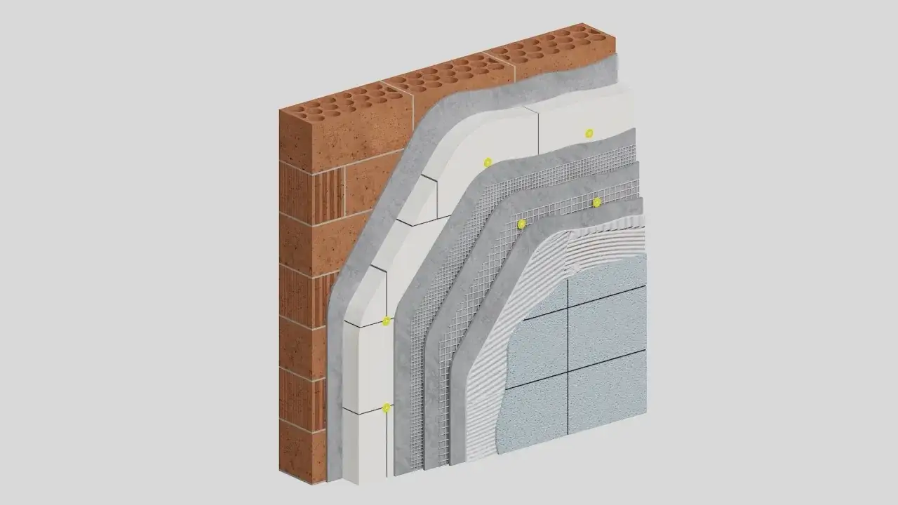 Corte de muro con capas de aislamiento, malla y acabado exterior, mostrando la estructura de un sate cer&aacute;mico.