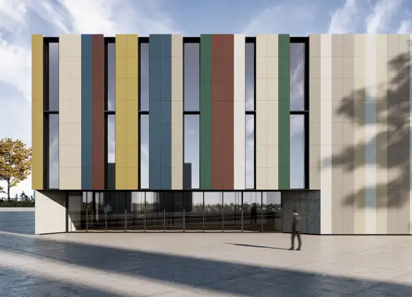 Edificio moderno con fachada de paneles verticales de colores, como si hubieran decidido enlucir pared exterior con un diseño vibrante.