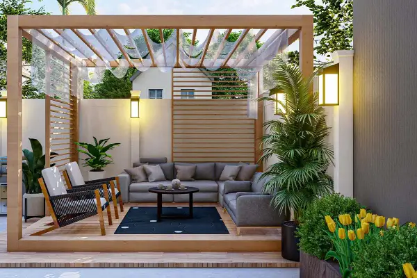 Un espacio acogedor con sofá, sillones y plantas, ideal para el diseño de jardines pequeños. Flores amarillas y luces cálidas crean un ambiente relajante.